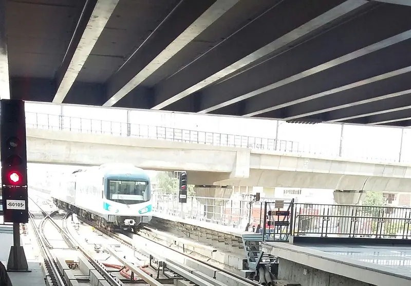 A Rapid Metro train arriving at a station, Gurugram